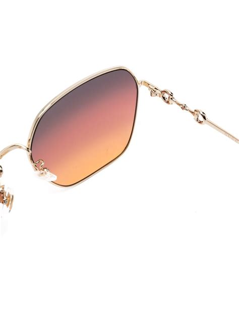 Horsebit aviator sunglasses in gold 